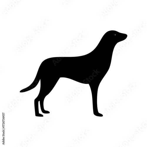 Elegant black silhouette of a noble dog standing proudly on white background