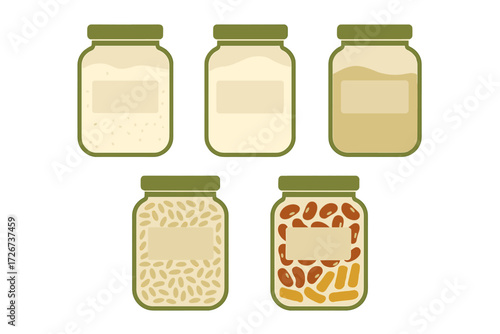 Kitchen pantry staples: a variety of different food items and liquids stored in clear glass jars with green lids