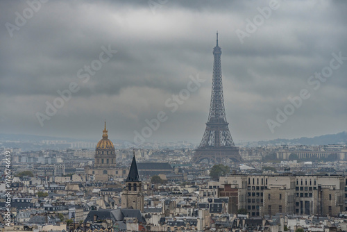 Paris, France - 09 24 2025: Panoramic view of the south of Paris with Eiffel Tower and Hotel des Invalides tower from top of The towers of Notre-Dame Cathedral De Paris