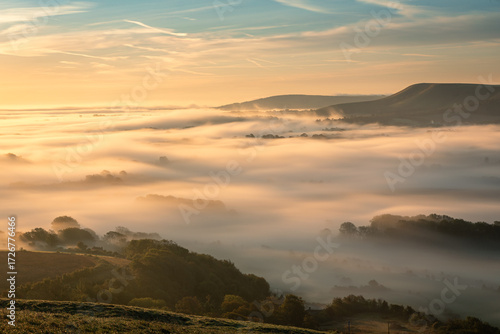Misty September morning from the view east from the top of Mount Caburn on the Lewes Downs east Sussex south east England UK