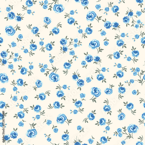 Vintage ditsy floral seamless pattern with small blue roses on a cream background. Romantic cottagecore flower print for fabric and wallpaper. Classic shabby chic design.