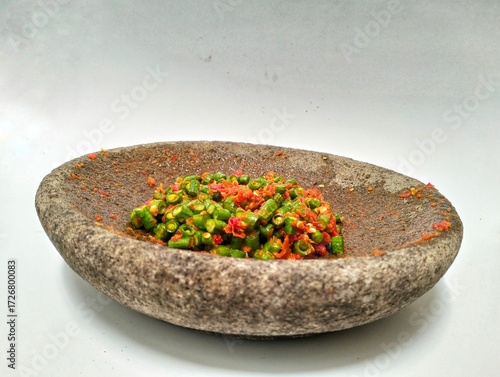 Indonesian specialty food “sambal pencok” long beans with chopped long beans cut into small pieces then mixed with chili sauce made from red chili peppers, onions, and other spices