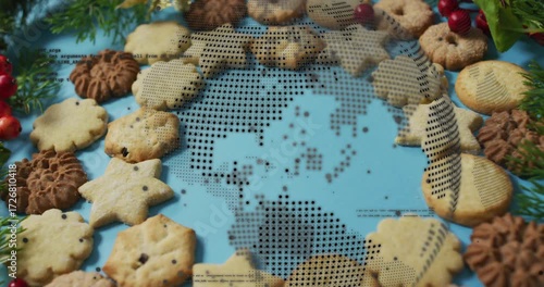 Upon play dotted globe overlay dissolving flickering dots from center revealing holiday cookie ring