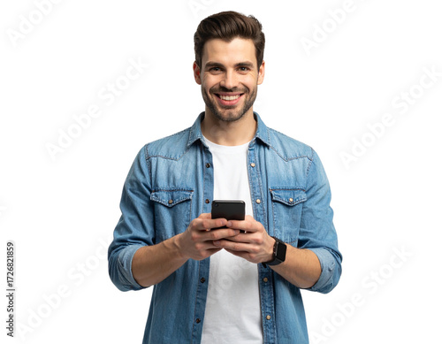Smiling Young Man Looking at Mobile Phone Screen with Both Hands, Isolated on White