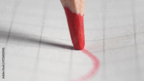 Drawing lines on checkered paper with a red pencil
