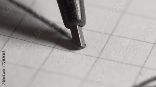 Making technical drawings with a coal -tipped pencil on paper