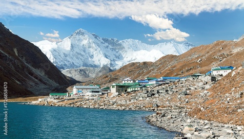 View of Gokyo lake and village with mount Cho Oyu
