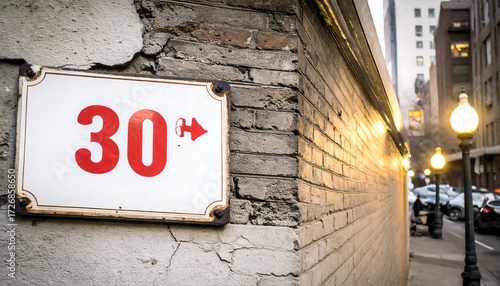 Street sign number 30 with arrow