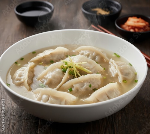 Dumpling Soup Mandu Guk (만두국) in Clear Broth, Piping Hot Stone Bowl
