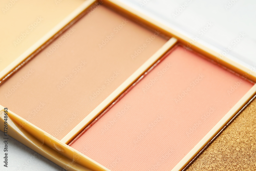 Fototapeta premium Beautiful eyeshadow palette on white background, closeup