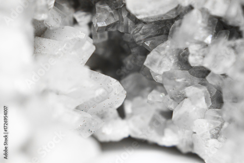 Schilderij op canvas Macro of black and white quartz mineral with layered stone texture and translucent crystal formations in the center