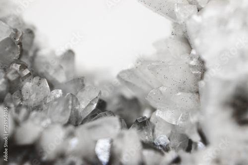 Fényképezés Macro of black and white quartz mineral with layered stone texture and translucent crystal formations in the center