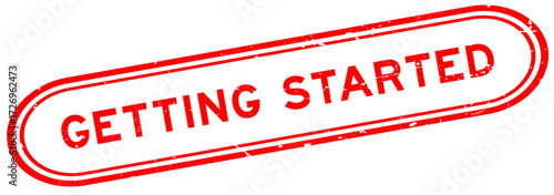 Grunge red getting started word rubber seal stamp on white background