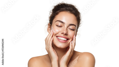 Smiling woman enjoying skincare routine, hands on face, natural beauty, white isolated background.