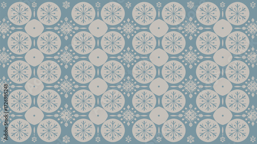Pattern of snowflakes and circles in light blue and white creating a wintery festive background design