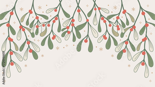 A decorative christmas background with mistletoe branches and small snowflakes on a light background