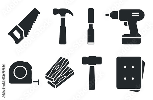 Silhouette of various carpentry tools on dark background