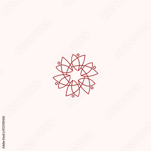 Abstract logo design in the shape of a geometric flower with a symmetrical pattern