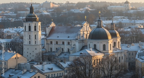 Snowy cityscape with historic buildings