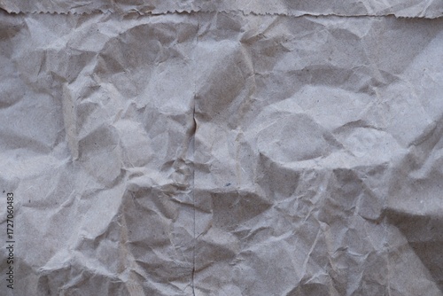 Brown crumpled recycled paper texture background. Kraft Paper