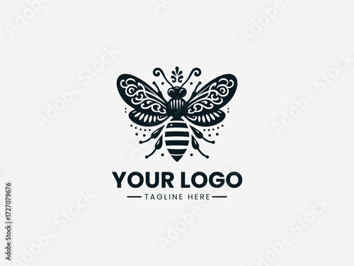 Ornate antique honey bee vector logo with detailed wings and vintage patterns for heritage brand identity