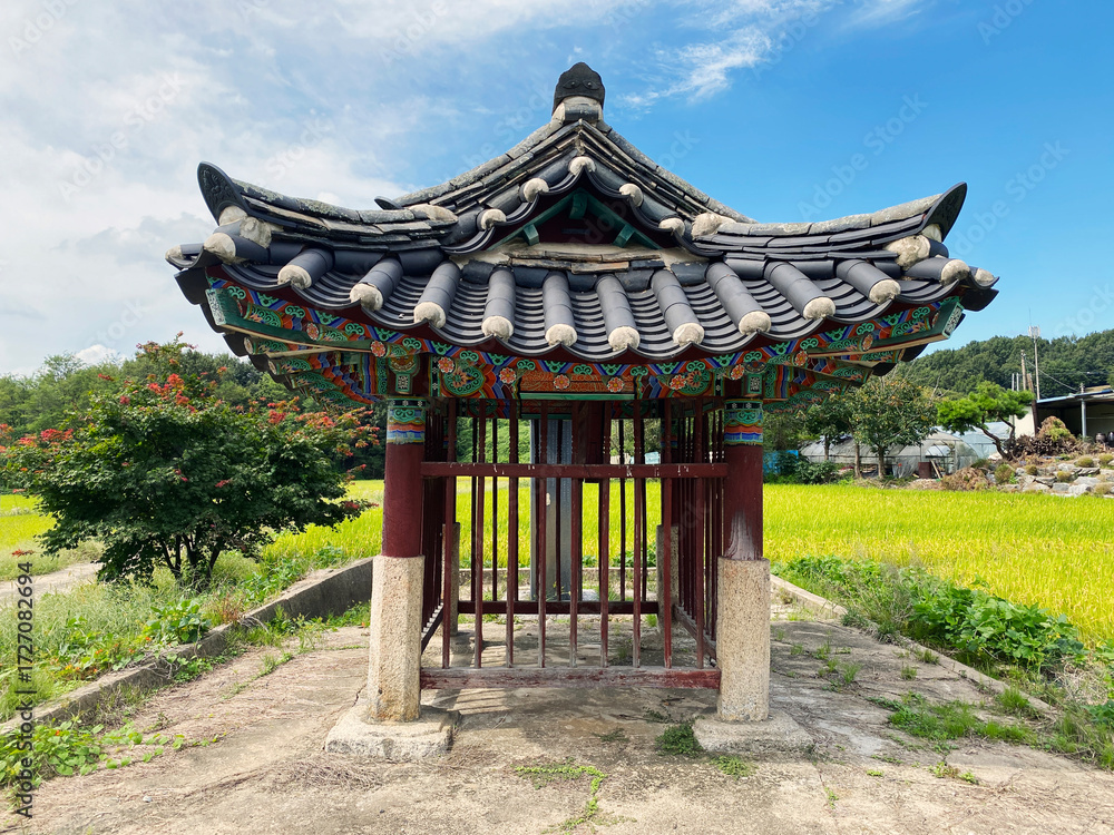 Obraz premium Traditional Korean stone monument pavilion protecting historic stele