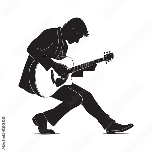 Silhouette of a Guitarist Playing an Electric Guitar