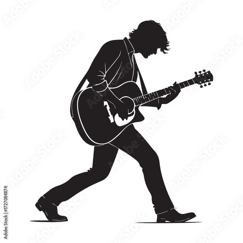 Silhouette of a Guitarist Playing an Electric Guitar