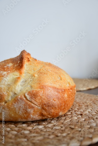 loaf of bread on wooden table
