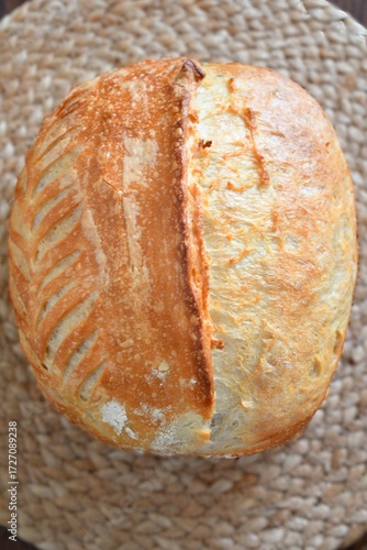 loaf of bread on wooden table