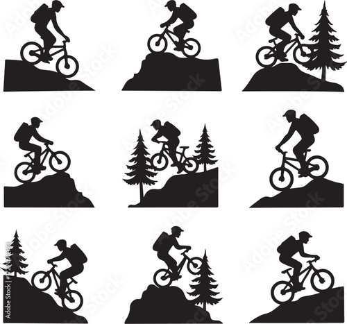 Mountain biker silhouettes on rocky terrain and pine trees