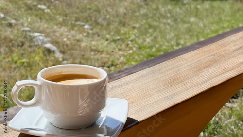 Slika na platnu A steaming demitasse of espresso nestles on rustic wood, perfect for Internation