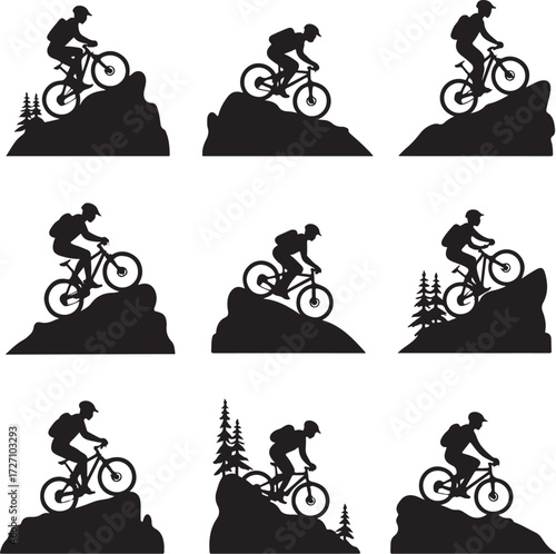 Mountain biker silhouettes on rocky terrain with trees