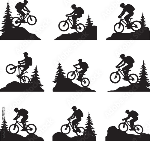 Mountain bikers silhouetted on hilly terrain with trees