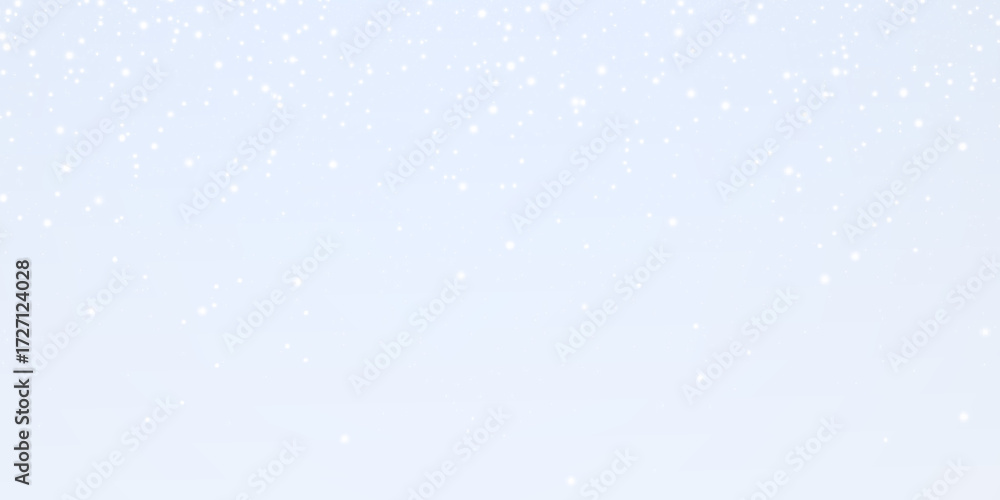 Fototapeta premium A beautiful depiction of gentle snowfall against a vivid blue sky, perfect for winter-themed projects.