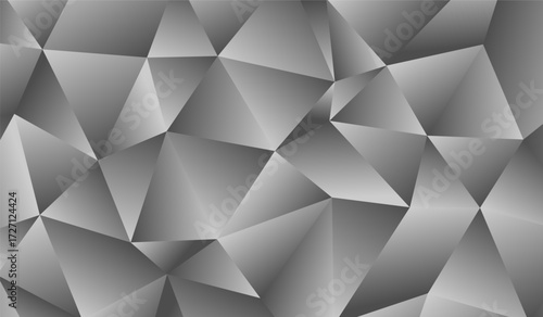 A vibrant composition of overlapping triangles and polygons in varying shades showcasing a captivating interplay of light and shadow.