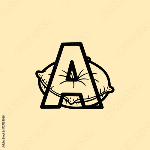 Stylized black outline letter A resting on a soft, plump pillow against a light beige background.