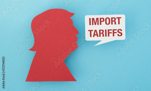 Import Tariffs text and a paper cutout of Trump's head on a blue background