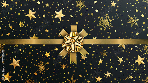 Gift box with golden bow and snowflakes on black background