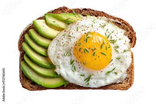 Fried egg and avocado toast on whole wheat bread, isolated on transparent background
