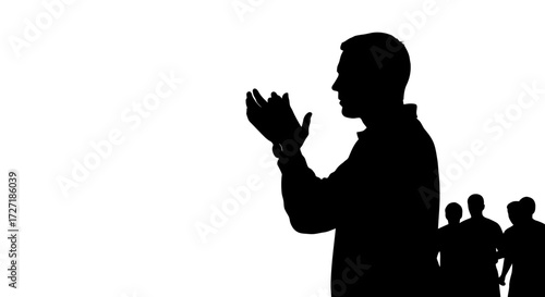 Silhouette of a man clapping enthusiastically with a crowd of people in the background against a white background symbolizing appreciation and celebration