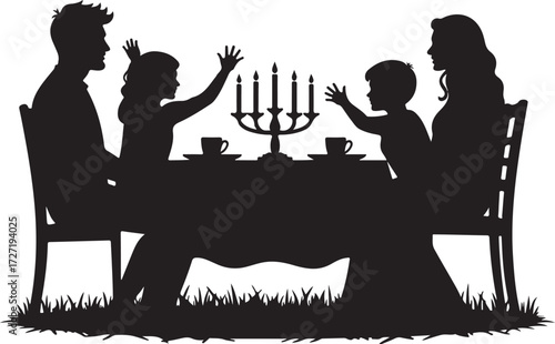 Family silhouette at table with menorah and cups candles