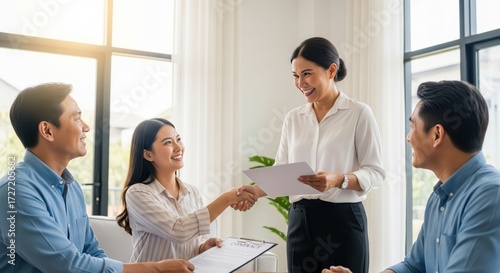 Asian Business Team Meeting and Shaking Hands