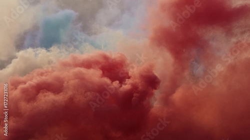 Red smoke cloud drifting from bengal torch, creating dramatic atmospheric background. 4K slow motion at 120 fps.