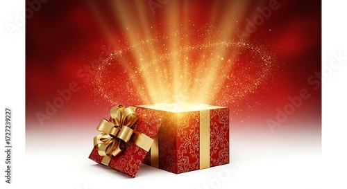 Open gift box with glowing magical light and sparkles