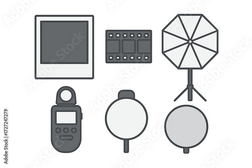 Photography studio equipment set with light meter, reflectors, softbox, film, and instant photo frame