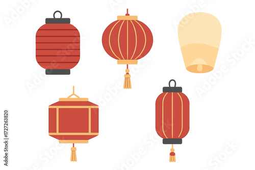 Bright red lanterns and one traditional sky lantern ready for a festive celebration during a night festival in a lively urban location