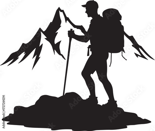 Silhouette of a hiker with backpack and trekking pole on rocky mountain peak