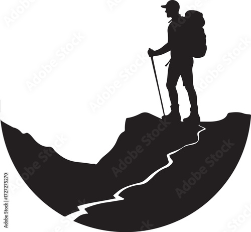 Silhouette of hiker with backpack and trekking pole on mountain path