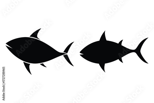 Two Solid Black Tuna Fish Silhouettes Facing Each Other marine ocean